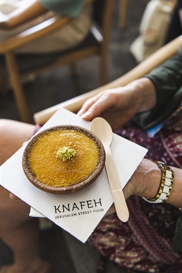 Knafeh being served